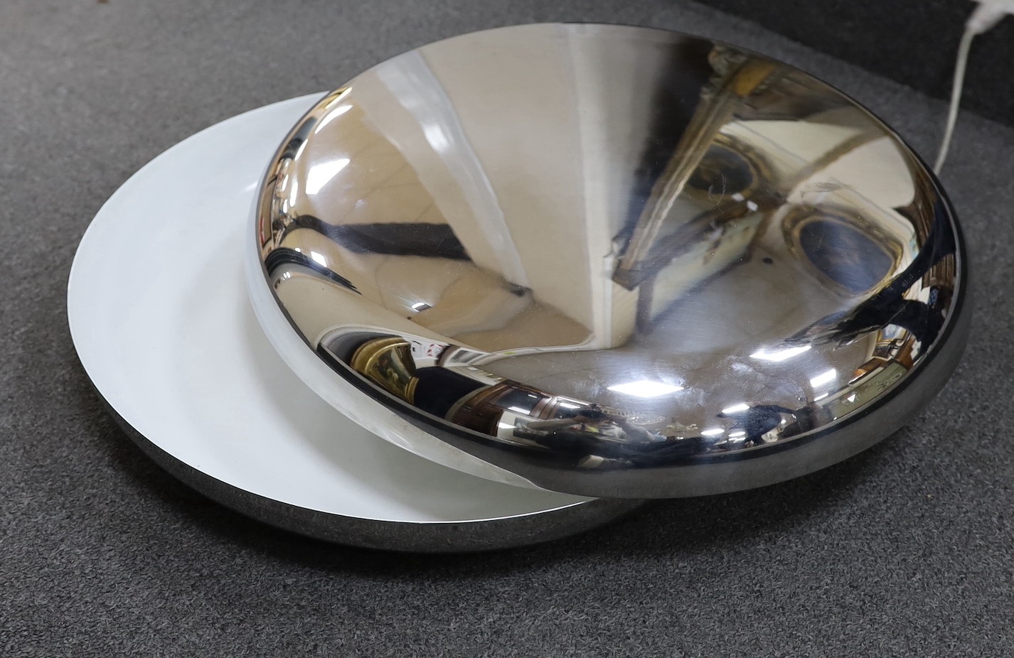 An Italian Fontana Arte chrome ‘swivel’ table lamp, 49cm diameter
